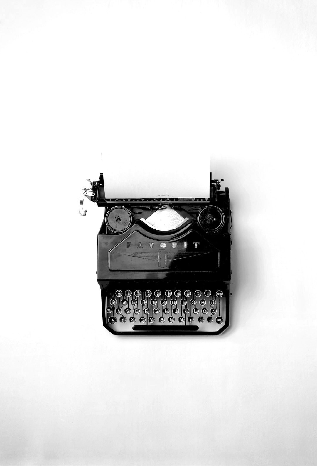 black Fayorit typewriter with printer paper black Fayorit typewriter with printer paper