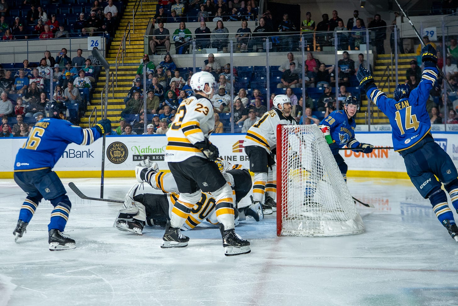 Springfield Thunderbirds forward Zach Dean (14) scores the game-winning goal in overtime against the Providence Bruins taking a 2-1 series lead.