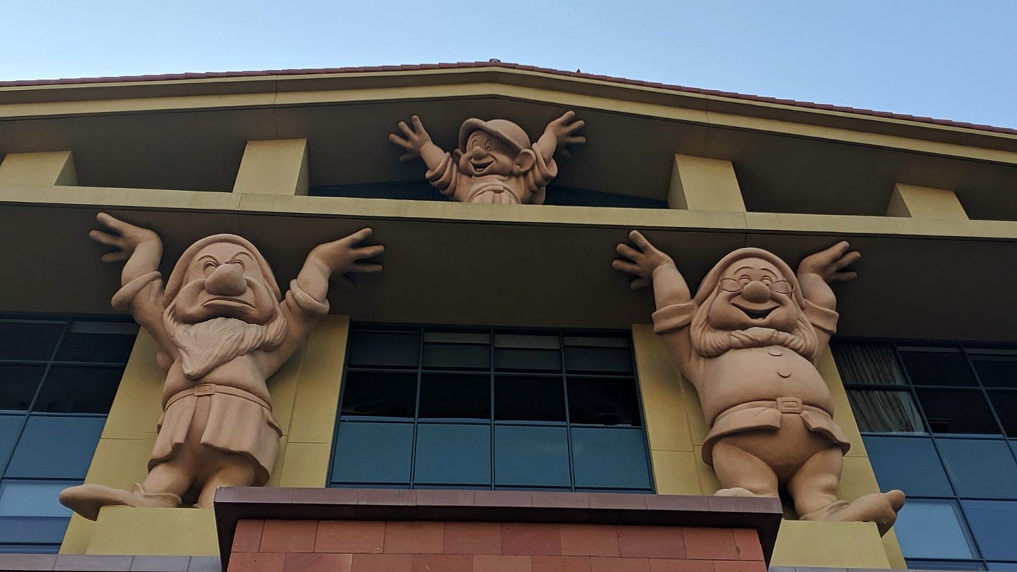 The Seven Dwarfs hold up the roof of Disney's Team Disney building in Burbank, California. Image: Cory Doctorow via Wikimedia Commons