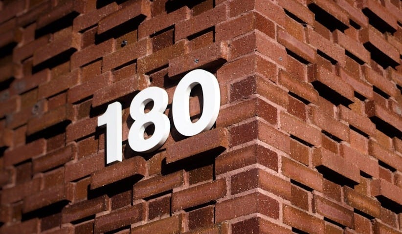 brown brick wall with number 10