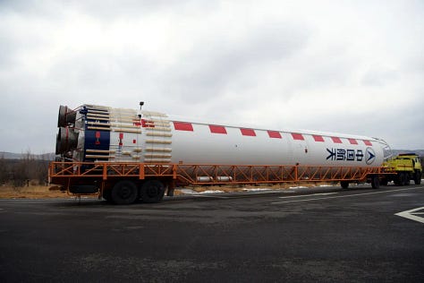 The Long March 2D's fairing and first-stage heading to and being placed onto Launch Complex 9.