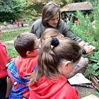 Budding artists prepare ground for artwork in the park