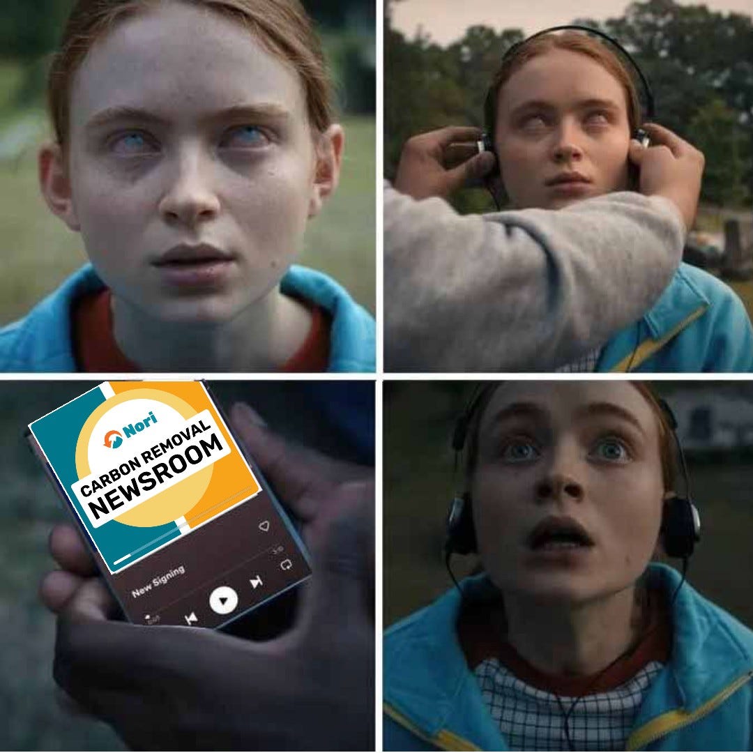 Four-panel Stranger Things meme. Max, eyes clouded white, floats in a trance under Vecna's spell; a hand holds up a phone playing a podcast whose cover reads "Nori CARBON REMOVAL NEWSROOM"; Max pulls on headphones and snaps out of it, wide-eyed.