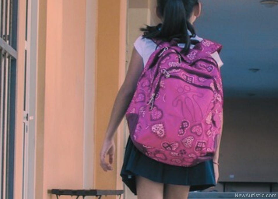 A schoolgirl walking away.
