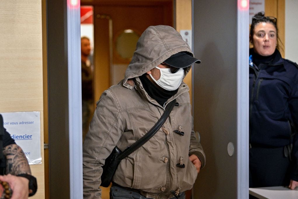 One defendant leaves court last week. Some have claimed they were brainwashed or drugged; all but 15 deny rape