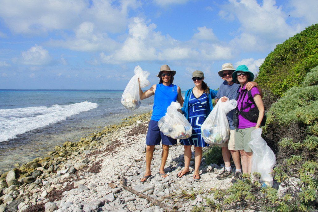 Me, Chelsea, and her parents scouring the beach for trash. Not pictured is the fantastic Leilah from Toronto, who also helped out. Me, Chelsea, and her parents scouring the beach for trash. Not pictured is the fantastic Leilah from Toronto, who also helped out.
