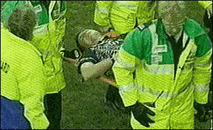 image: [ Linesman Edward Martin was stretchered off unconscious ]
