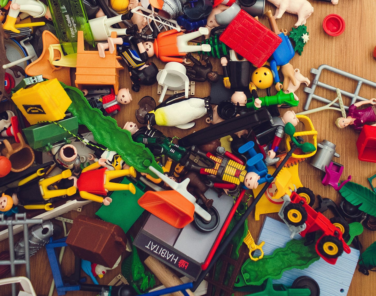 Toys spread allover the floor in a messy way Toys spread allover the floor in a messy way