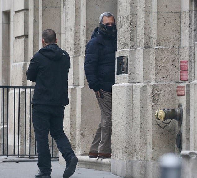 Netanyahu challenger Ehud Barak hides his face as he enters entering ...
