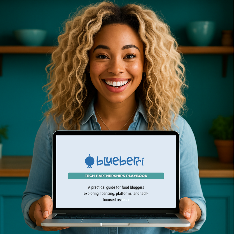 A young Black woman with long curly hair holding a laptop displaying the Tech Partnerships Playbook and Blueberri Pi logo. A young Black woman with long curly hair holding a laptop displaying the Tech Partnerships Playbook and Blueberri Pi logo.