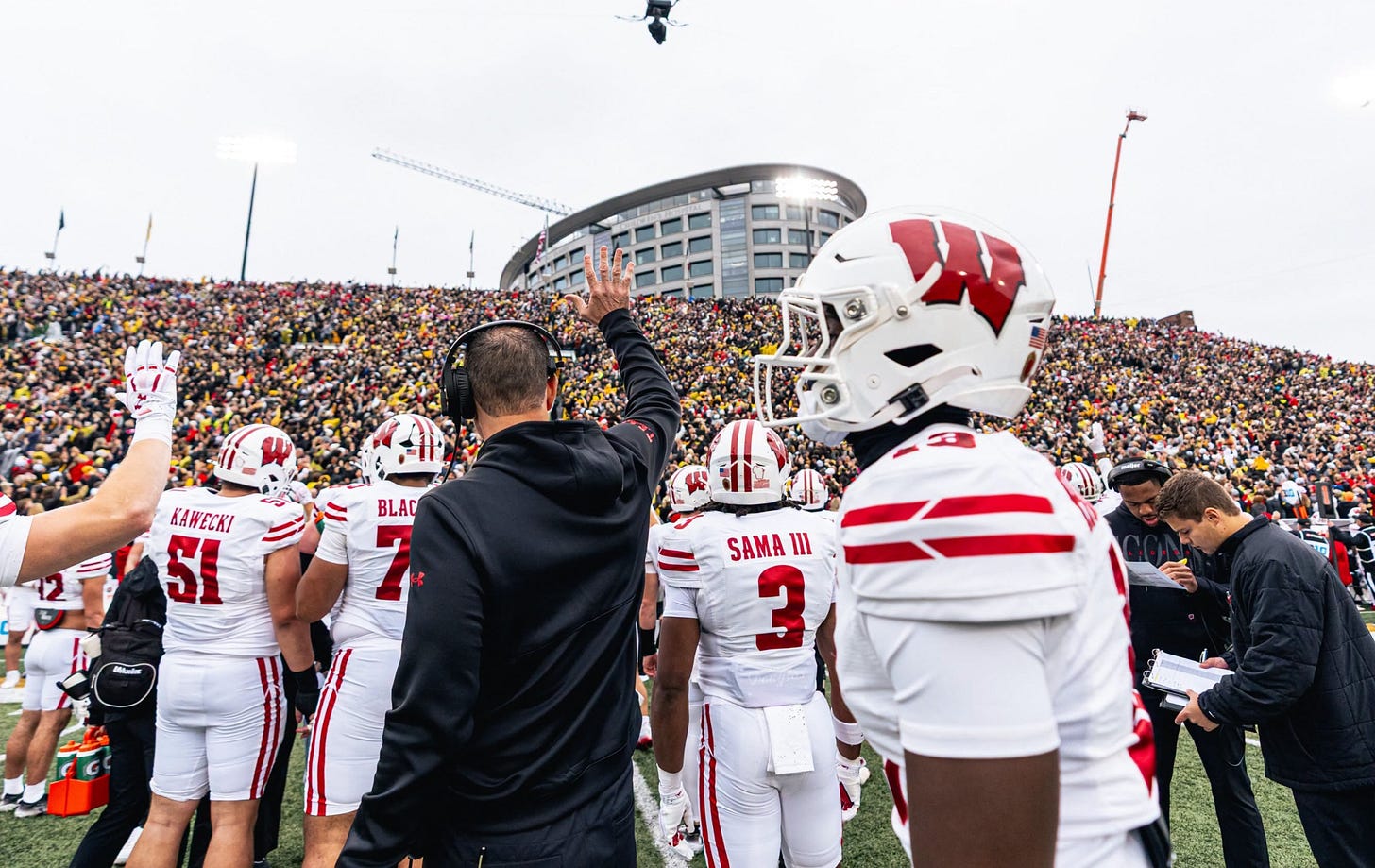 Wisconsin Badgers football players participate in the Hawkeye Wave, a tradition honoring children and families at the University of Iowa Stead Family Children’s Hospital overlooking Kinnick Stadium. Wisconsin Badgers football players participate in the Hawkeye Wave, a tradition honoring children and families at the University of Iowa Stead Family Children’s Hospital overlooking Kinnick Stadium.