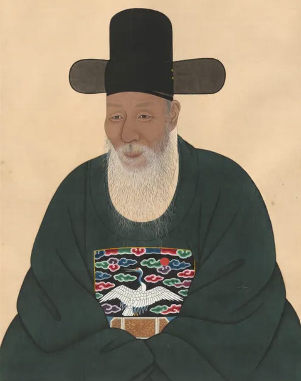 A person with a long white beard and a black hat

AI-generated content may be incorrect.