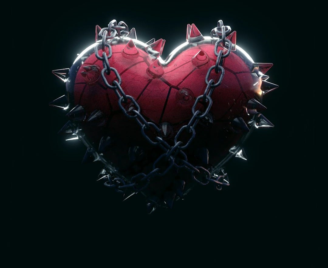 A red heart wrapped tightly in metal chains and spikes, symbolizing fear, pain, and emotional restraint before release. A red heart wrapped tightly in metal chains and spikes, symbolizing fear, pain, and emotional restraint before release.