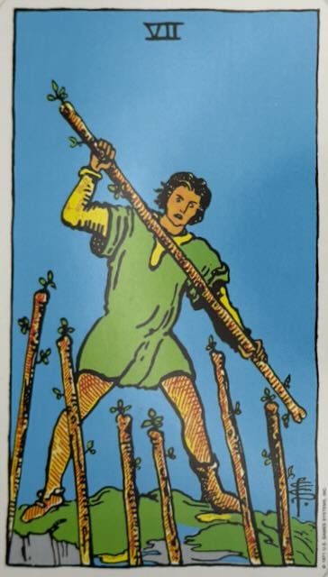 The 7 of Wands tarot card and the All Paths Lead Home oracle card.