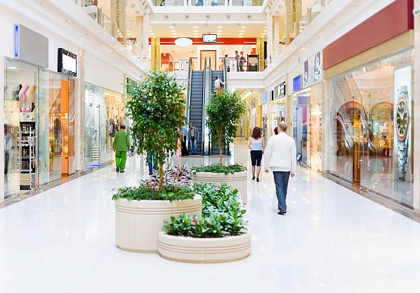 Shopping hall #4. Motion blur Shopping hall #4. Motion blur. Focus on escalator mall retail store pictures stock pictures, royalty-free photos & images