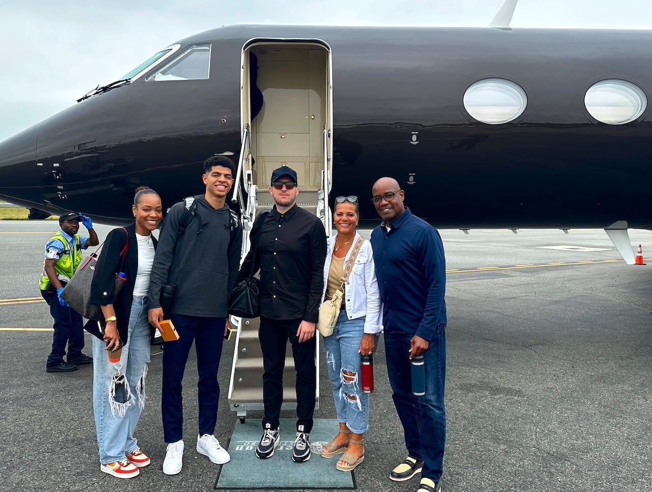 Ben Sheppard before boarding the plane with his family and agent, George Langberg, bound for Indy.
