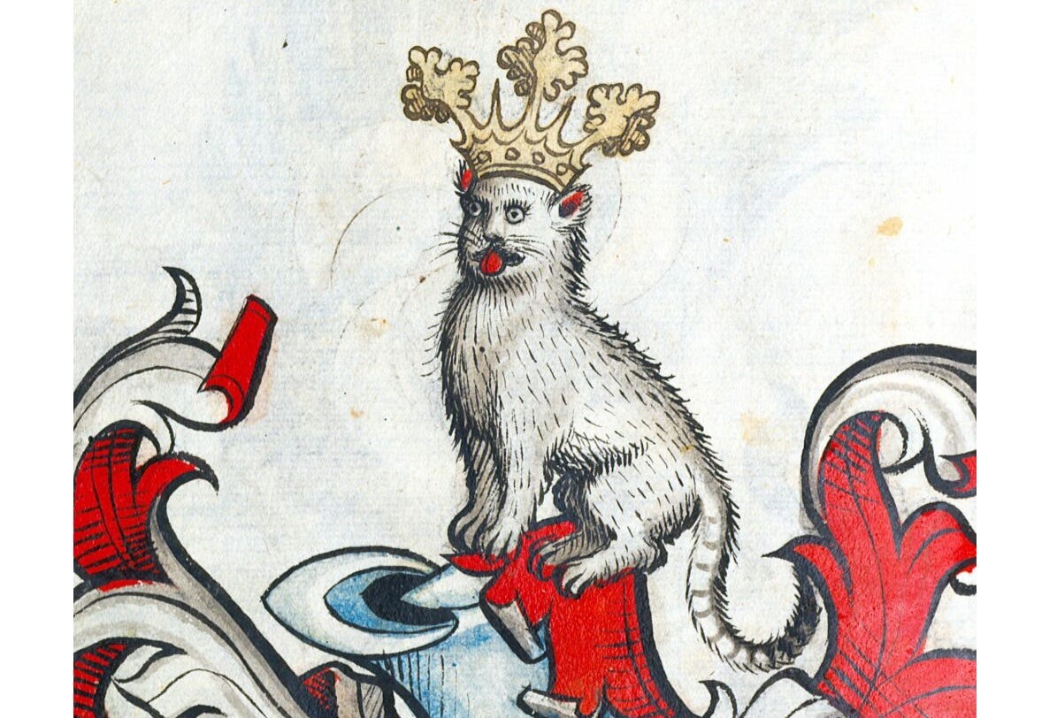 Medieval illustration of a cat with disturbingly humanlike facial features, wearing a crown and sticking out its tongue. 
