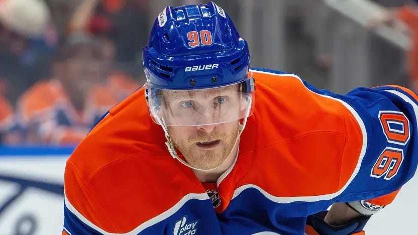 Corey Perry watches the faceoff