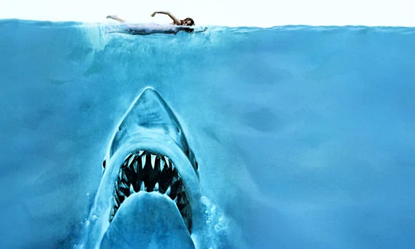 Original 1975 poster illustration for Jaws, showing a great white shark rising from the depths toward an unaware swimmer at the surface. Original 1975 poster illustration for Jaws, showing a great white shark rising from the depths toward an unaware swimmer at the surface.