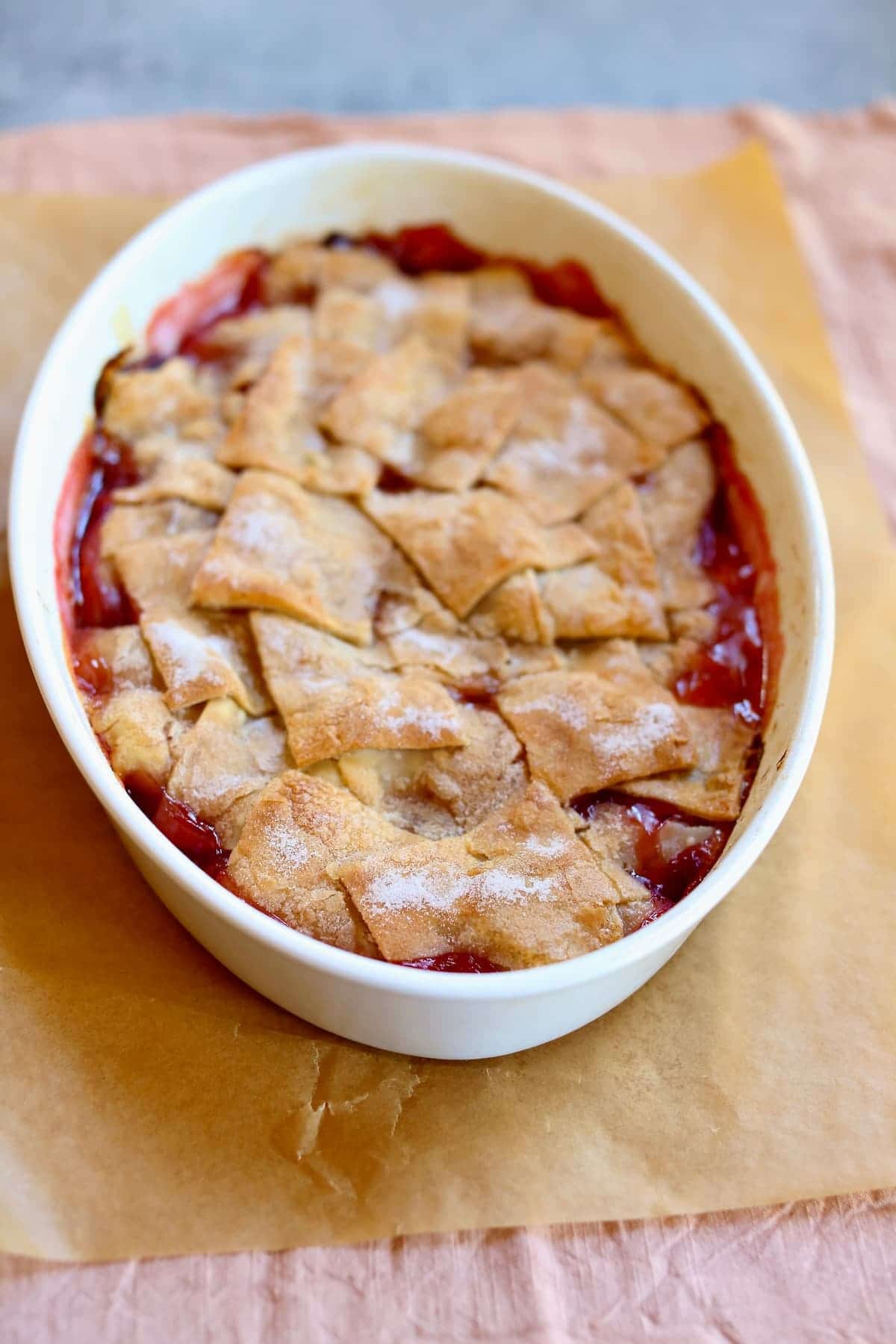 a baking dish of peach cobbler.