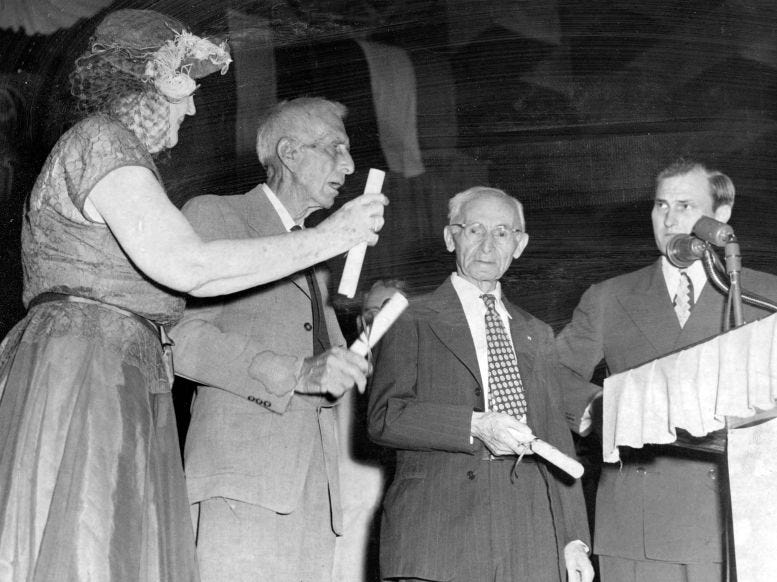 Miami Pioneers Mrs. John Frohock, William Mark Brown, Isidor Cohen, and Miami Mayor Robert L. Floyd (from left to right), who presented a scroll on the city’s birthday, July 28, 1949. Courtesy the Miami Herald, photographer Bob Verlin.