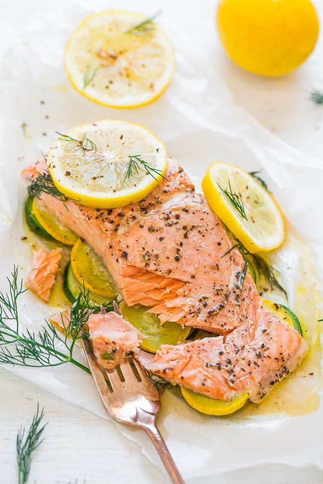 Lemon Dill Salmon with Vegetables in Parchment - Tender salmon with vegetables and it's so EASY, healthy, ready in 20 minutes, and loaded with bold LEMON and dill flavor!! Put it on your dinner rotation!! Lemon Dill Salmon with Vegetables in Parchment - Tender salmon with vegetables and it's so EASY, healthy, ready in 20 minutes, and loaded with bold LEMON and dill flavor!! Put it on your dinner rotation!!