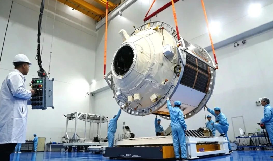 A Qingzhou cargo spacecraft in the late stages of production with most external hardware installed. A Qingzhou cargo spacecraft in the late stages of production with most external hardware installed.