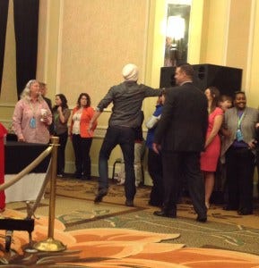 Jared high fives fans on his way offstage