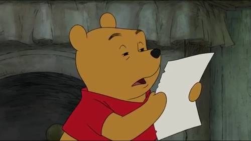 Winnie the Pooh Squinting at Paper Winnie the Pooh Squinting at Paper