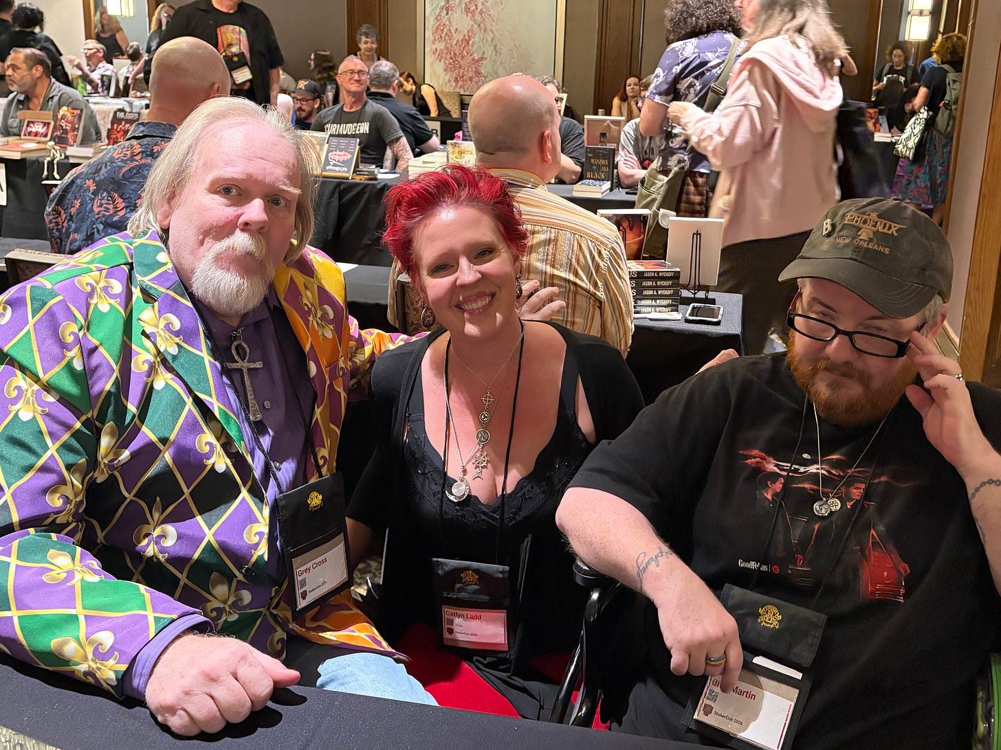 photo of two men and a woman