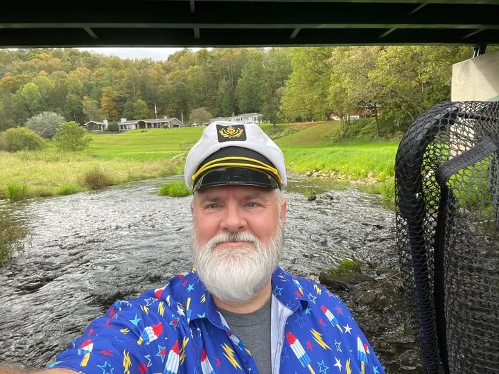 May be an image of 1 person, beard and covered bridge