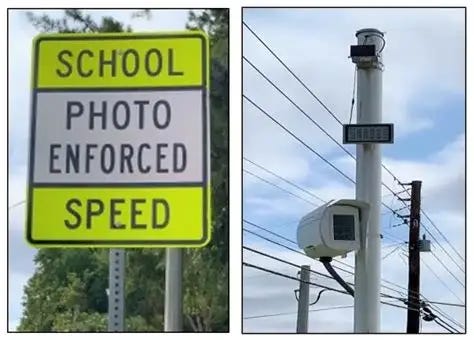 picture of kids getting on bus, speeding cameras
