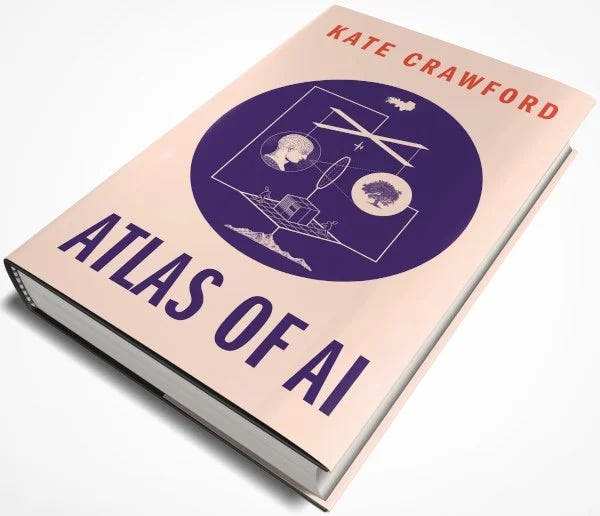 The cover design is striking and deliberately anti-tech-dystopian. Instead of the usual AI imagery (robots, circuit boards, glowing blue neural networks), it features a circular diagram with interconnected elements:  A classical bust of a human head (representing human cognition/labor) A tree (nature/environmental resources) Mountains at the bottom (mineral extraction/geological resources) A central structure that looks like server racks or data centers Small human figures working around the infrastructure An oval shape in the center (possibly a lens or sensor) Lines connecting everything, suggesting interdependence A cloud at the top