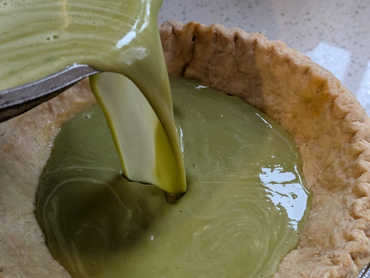 Pandan coconut tart, sliced and ready to eat, and being poured to bake.