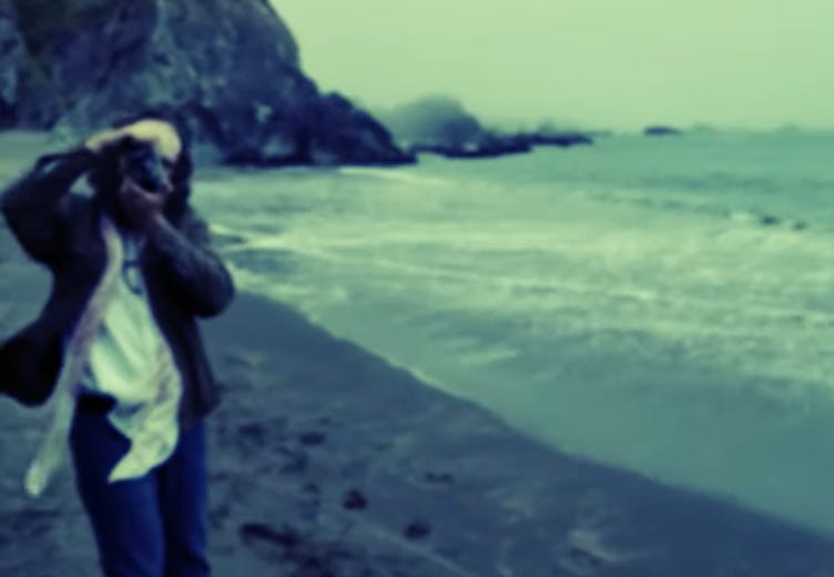 A person taking a picture of a person on a beach

AI-generated content may be incorrect.