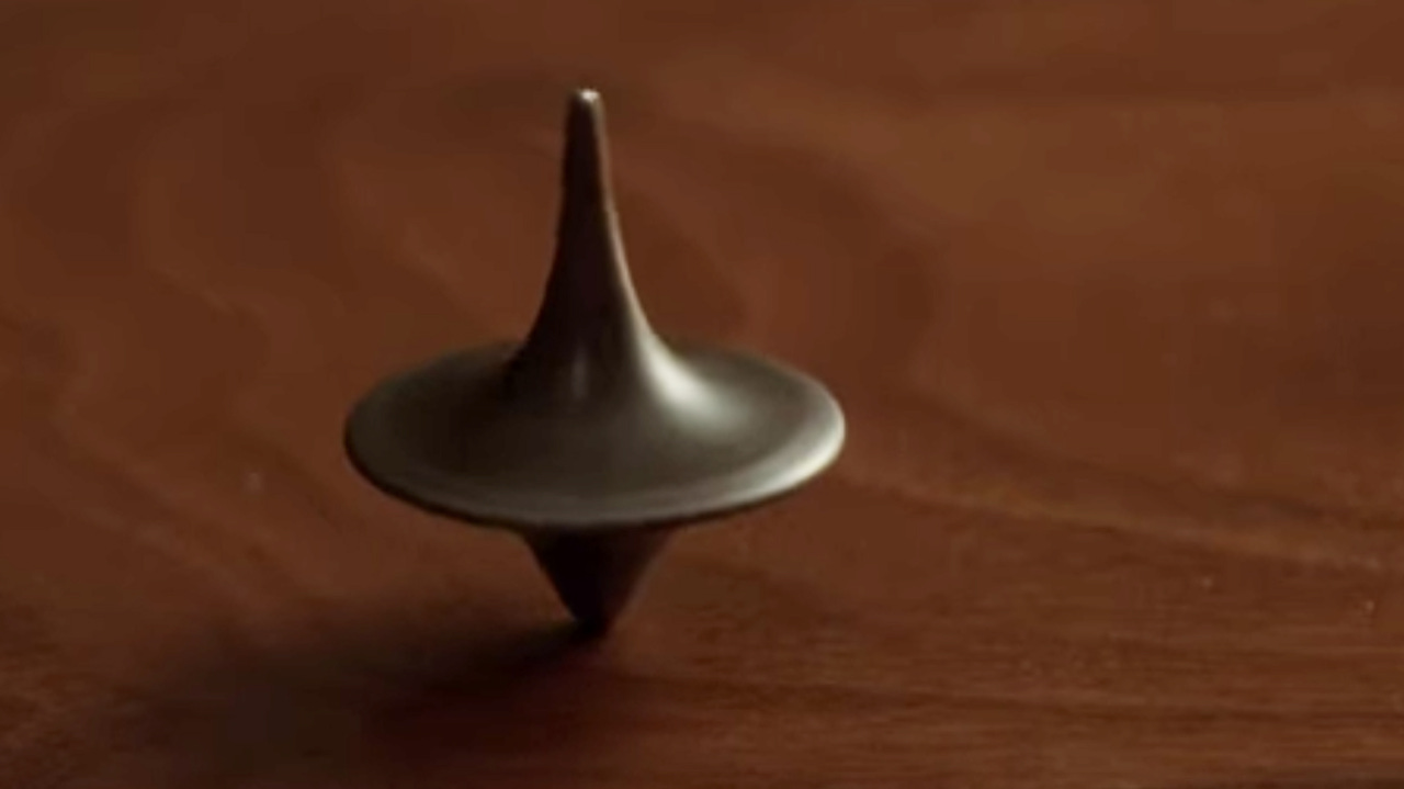 It kept spinning. I stopped waiting for the answer. (Inception, Warner Bros.)