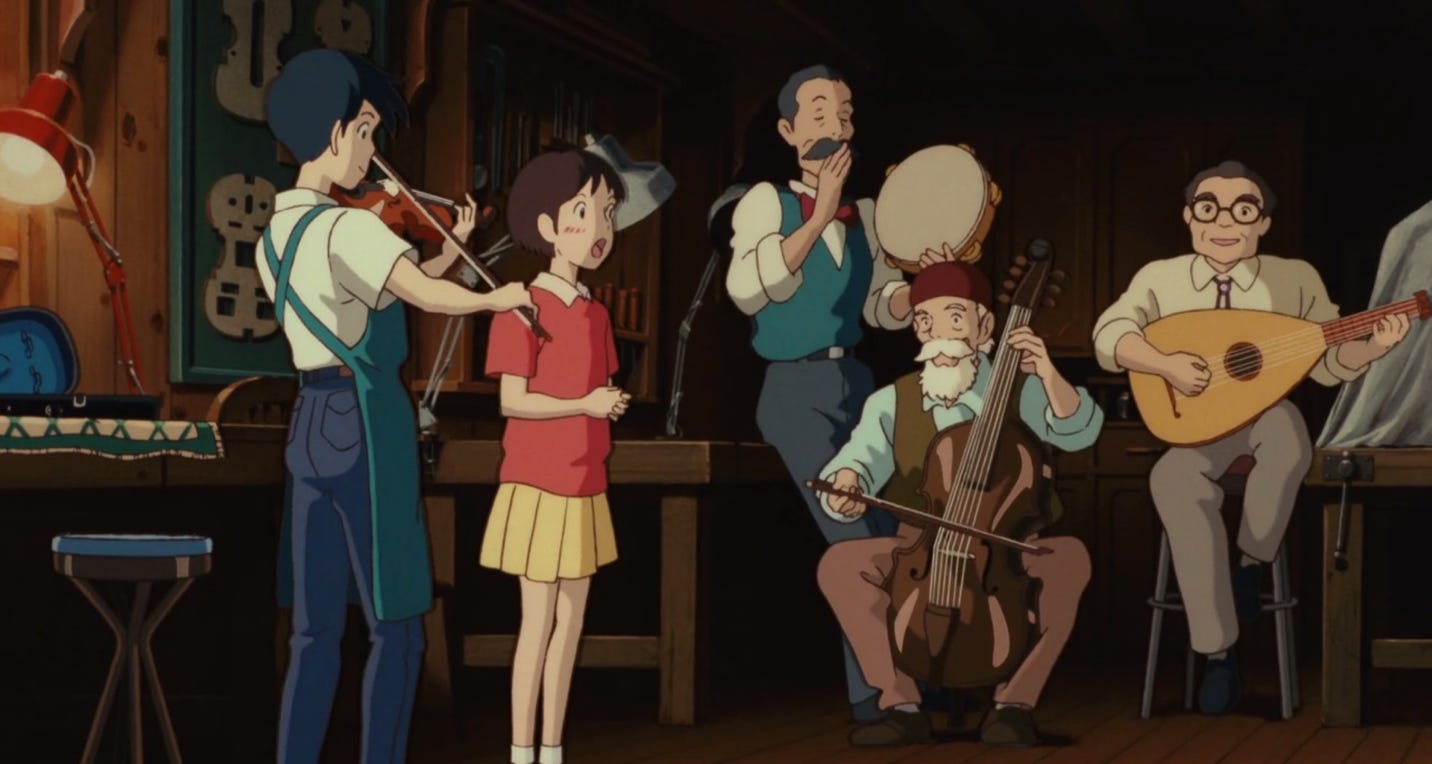 A group of people playing musical instruments

Description automatically generated