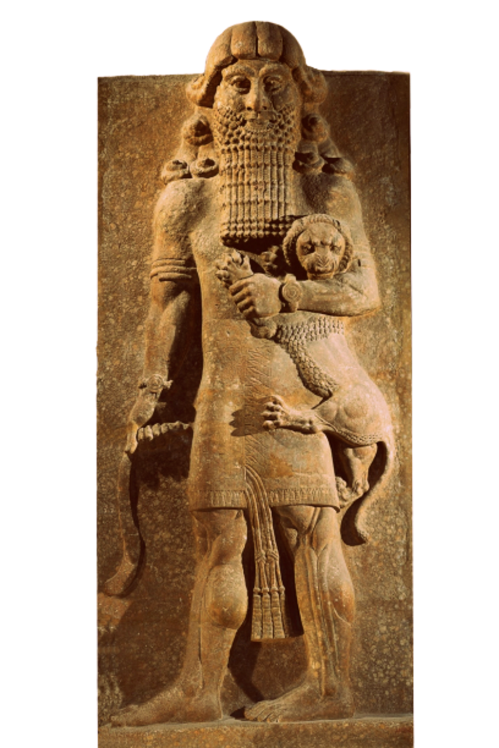 An ancient sculpture of Gilgamesh wrestling a lion.