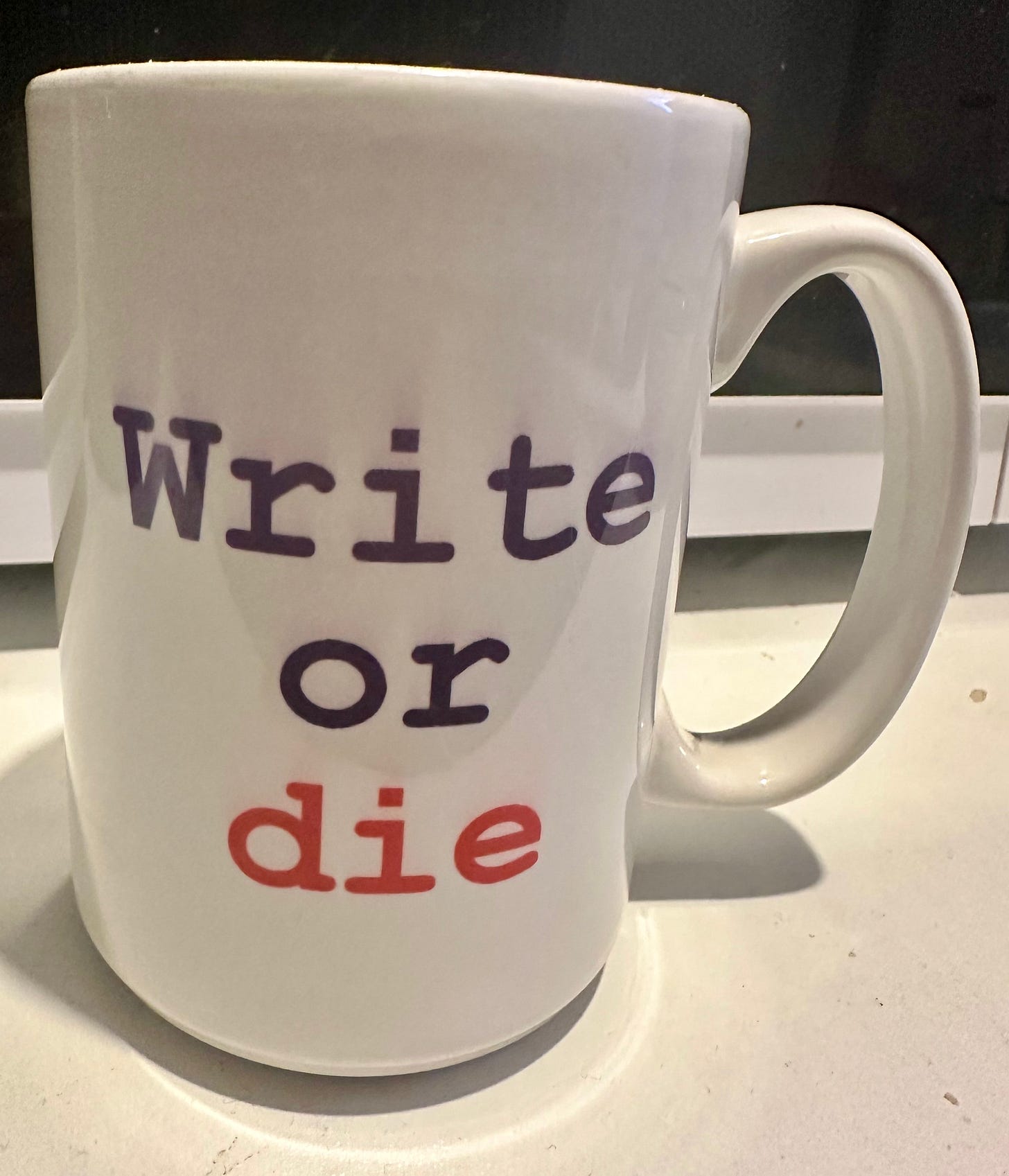 A mug with 'Write or Die' on it.