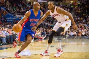 Jodie Meeks #20 of the Detroit Pistons drives around James Jones #1 of the Cleveland Cavaliers during the first half at Quicken Loans Arena on April 13, 2014 in Cleveland, Ohio. April 13, 2015| Credit: Jason Miller