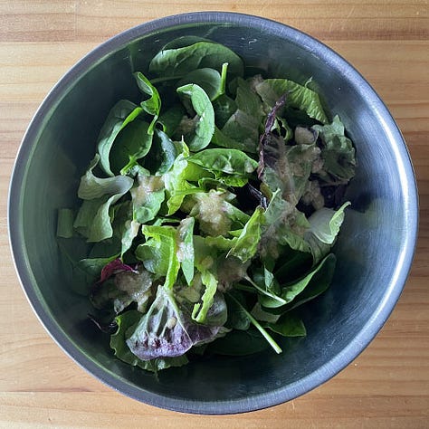 Mixing a salad together