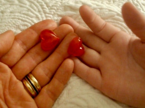 teddy and mom, heart in hands teddy and mom, heart in hands