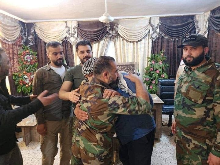 May be an image of 4 people, beard, people standing and military uniform May be an image of 4 people, beard, people standing and military uniform