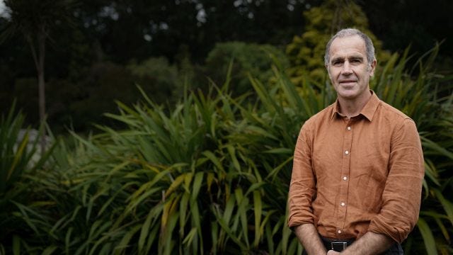 Photo of Scott Willis in front of plants Photo of Scott Willis in front of plants