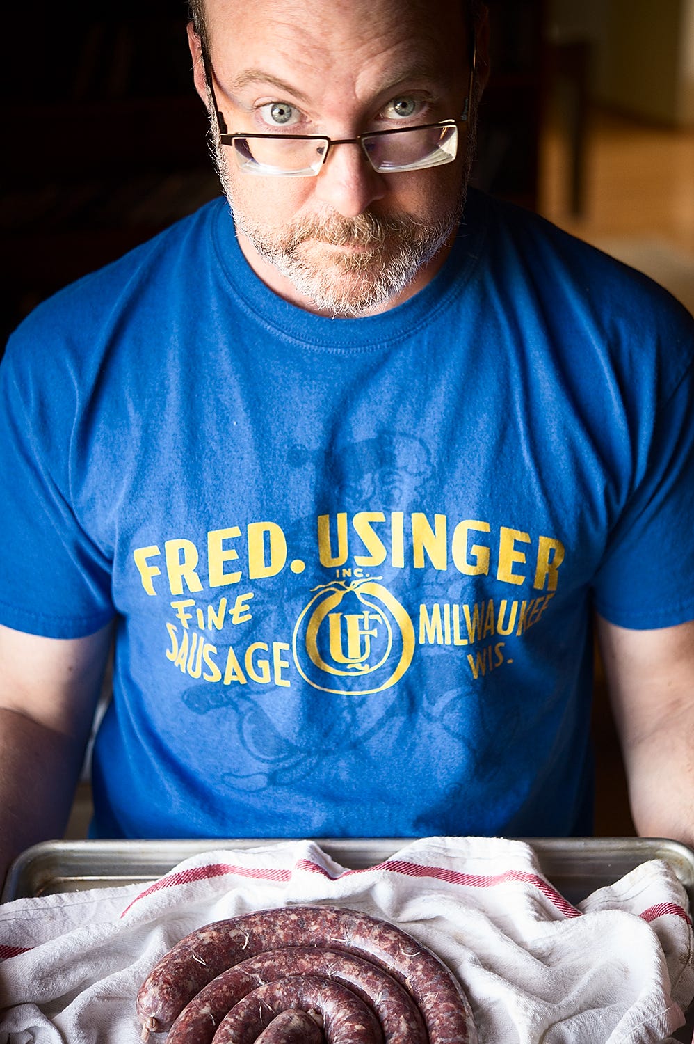 Hank Shaw offering you some sausages.