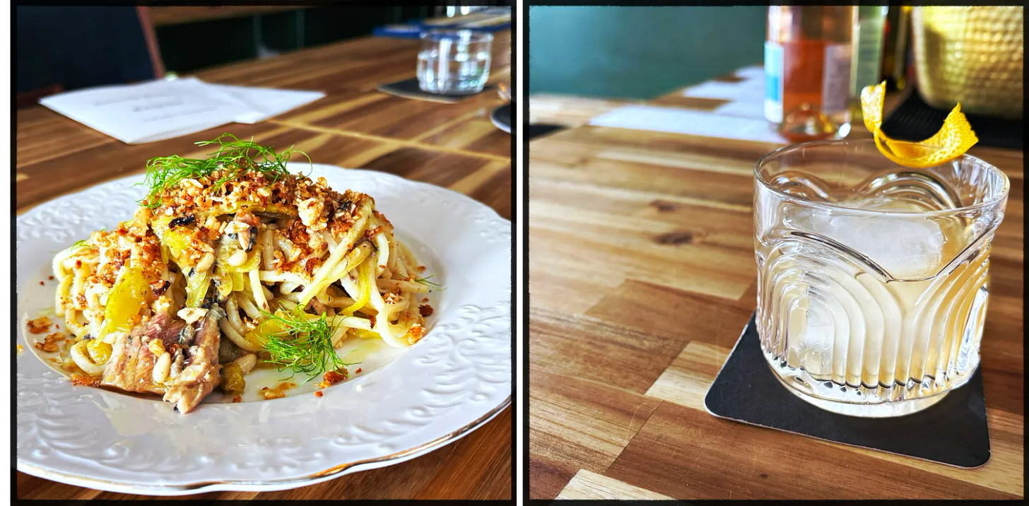 A pasta dish and a cocktail. A pasta dish and a cocktail.