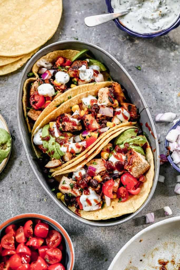 Three BBQ Chicken Tacos on an oval bowl.