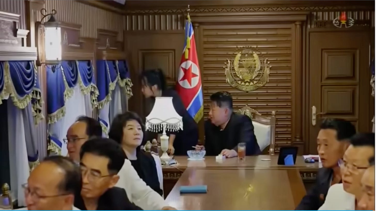 A group of people sitting at a table

AI-generated content may be incorrect.