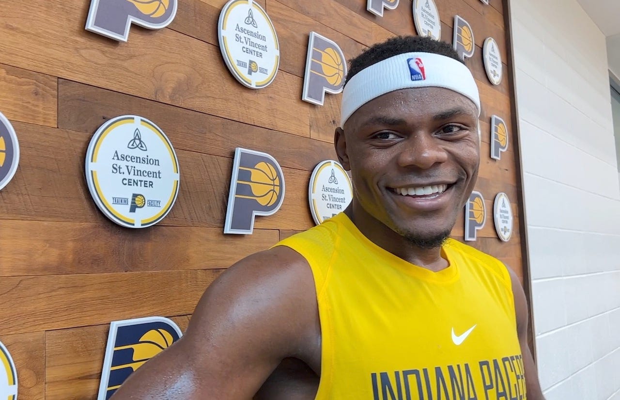 Kentucky's Oscar Tshiebwe talks with reporters after his Pacers workout.