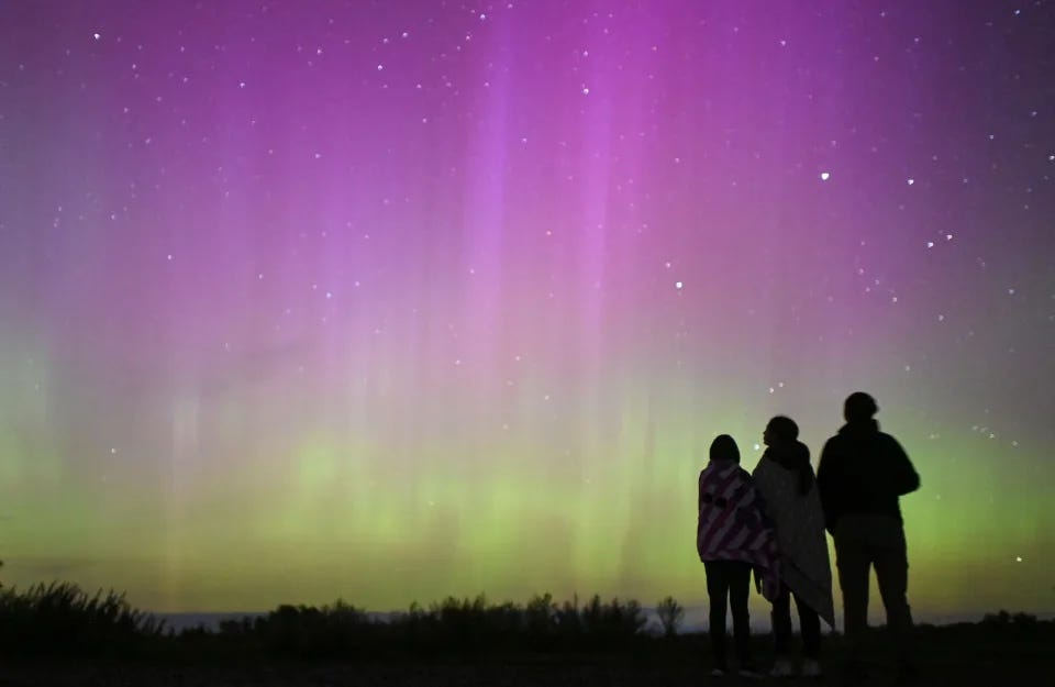 The Aurora Borealis, also known as the "Northern Lights", illuminate the sky as people gather to watch the annual Perseid meteor shower near the village of Borodinka in the Omsk region, Russia August 13, 2024. The Aurora Borealis, also known as the "Northern Lights", illuminate the sky as people gather to watch the annual Perseid meteor shower near the village of Borodinka in the Omsk region, Russia August 13, 2024.